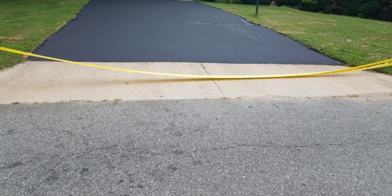 Freshly Sealed Blacktop Driveway