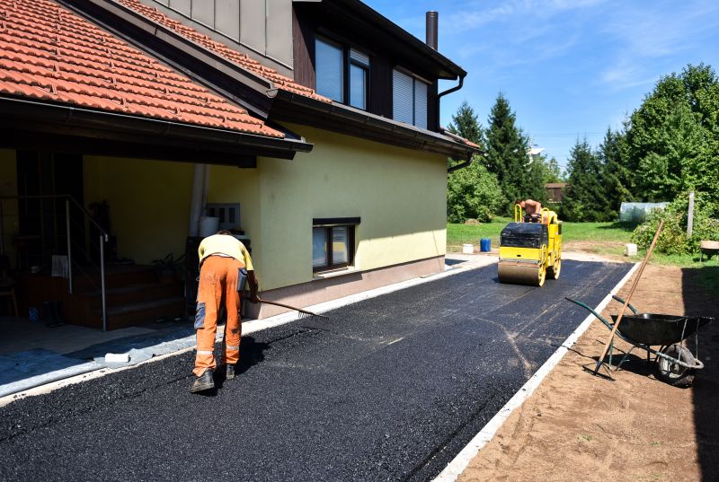 Local Blacktop Driveway Sealing pros at work